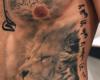 http://www.tattooset.com/images/tattoo/2014/02/03/22391-tatuaje-realista-de-leon-y-letras-chinas_tiny.jpg