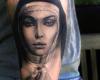 Tatuaje de Virgen realista