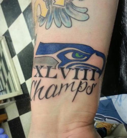 Seattle Seahawks Champs tattoo