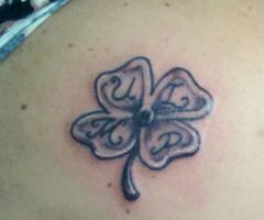 Four leaf clover tattoo