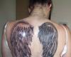 Wing tattoo on back