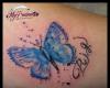 Butterfly watercolor tattoo