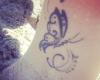 http://www.tattooset.com/images/tattoo/2014/03/13/22612-butterfly-tattoo-for-women_tiny.jpg