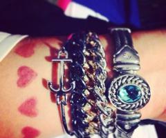 Heart bracelet tattoo