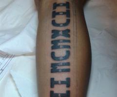 Roman numerals tattoo