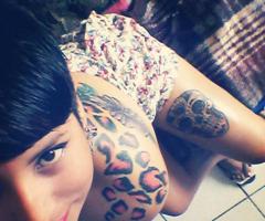 Animal print and sugar skull tattoo
