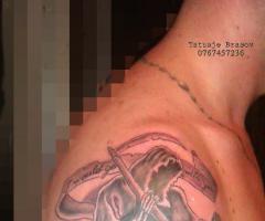 angel and death half sleeve tattoo