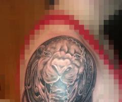 lion armor tattoo