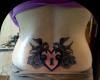 http://www.tattooset.com/images/tattoo/2014/05/04/22900-tatuaje-golondrinas-corazones_tiny.jpg