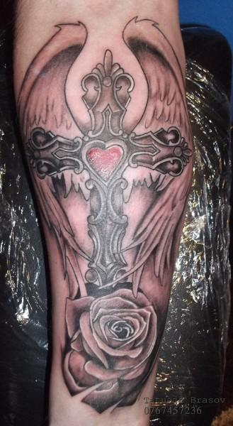 cross and rose tattoo