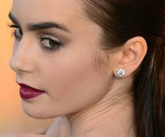 Lily Collins love tattoo