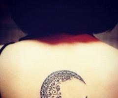 Moon back tattoo