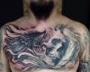 Skull tattoo on chest