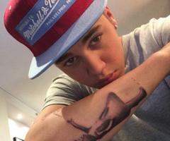 Justin Bieber arm tattoo