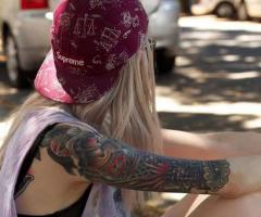 Skater girl with tattoos