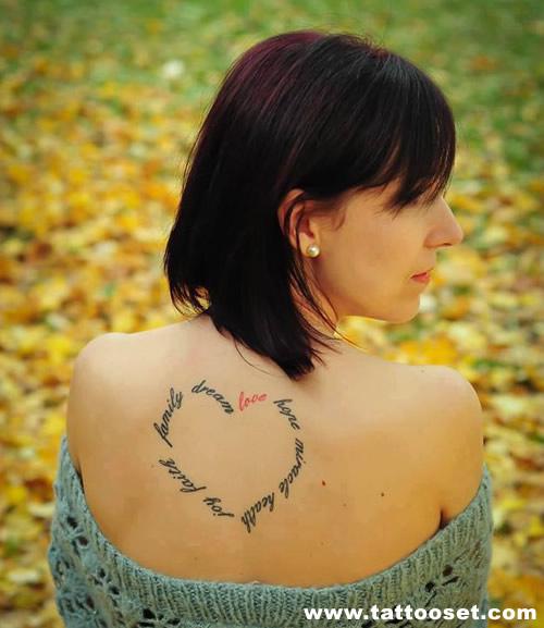 Heart quote tattoo on back