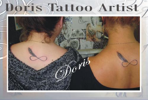 Infinity feather tattoo