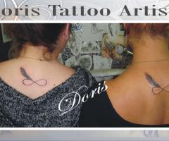 Infinity feather tattoo