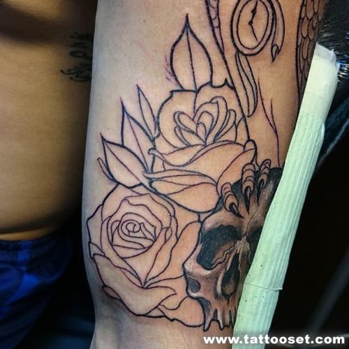 Rose and skull tattoo