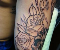 Rose and skull tattoo