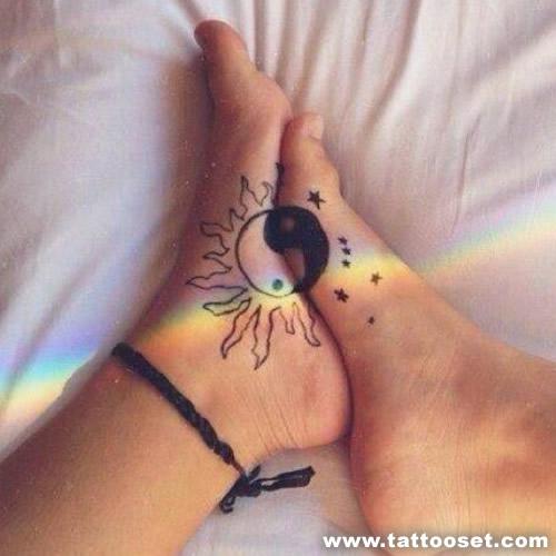 Yin and yang couple tattoo