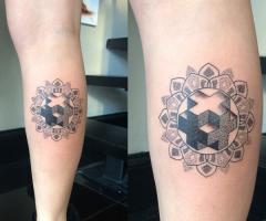 Mandala dotwork tattoo