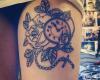 Clock tattoo on sexy leg