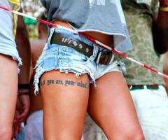 Quote tattoo on leg