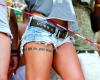 Quote tattoo on leg