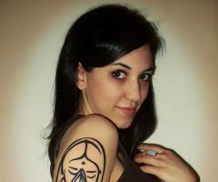 Religious hindu woman tattoo