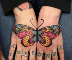 Butterfly tattoo on hand