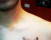 Tatuaje de Buho en el pecho