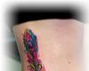 http://www.tattooset.com/images/tattoo/2014/12/04/24447-watercolor-peacockfeather-tattoo_tiny.jpg