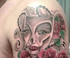 Tatuaje Brasov mask and rose tattoo