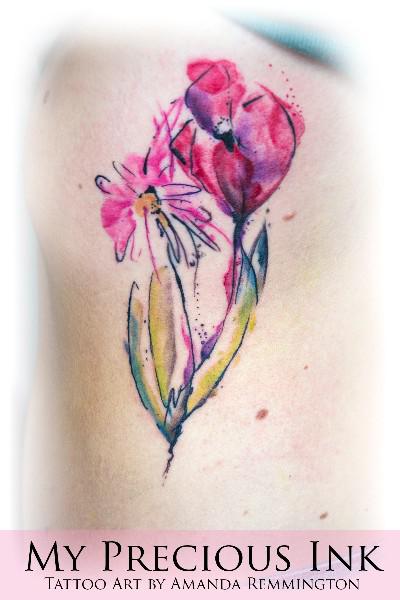 Abstract watercolor flower tattoo