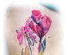 Abstract watercolor flower tattoo