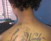 Tatto en la espalda nombre Wendy