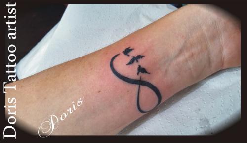 Infinity birds tattoo